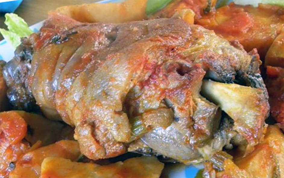 Cypriot roast pork shank on a bed of celeriac