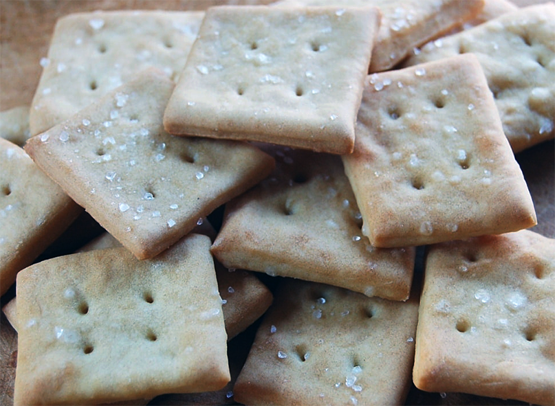 pile of home-made saltine crackers