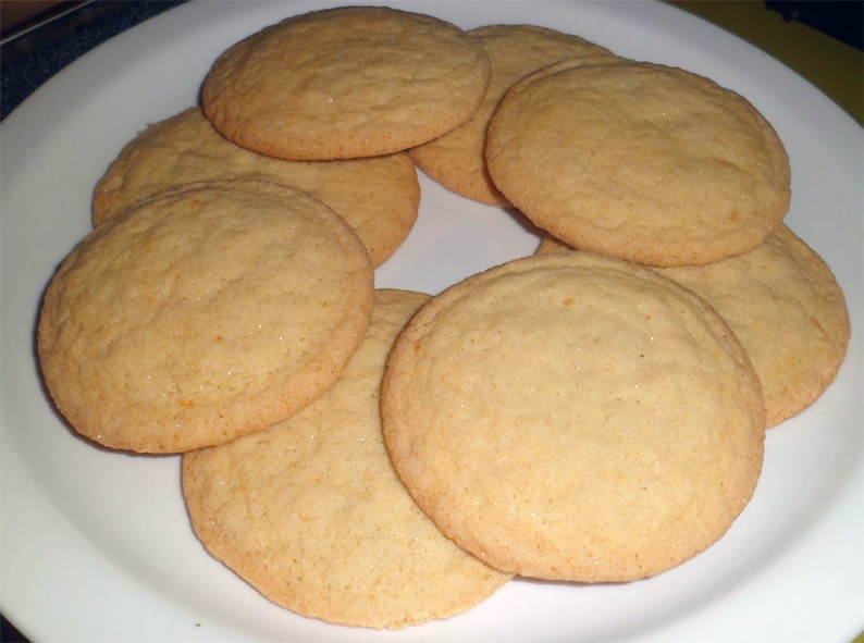 plain shrewsbury cake biscuits arranged on a plate