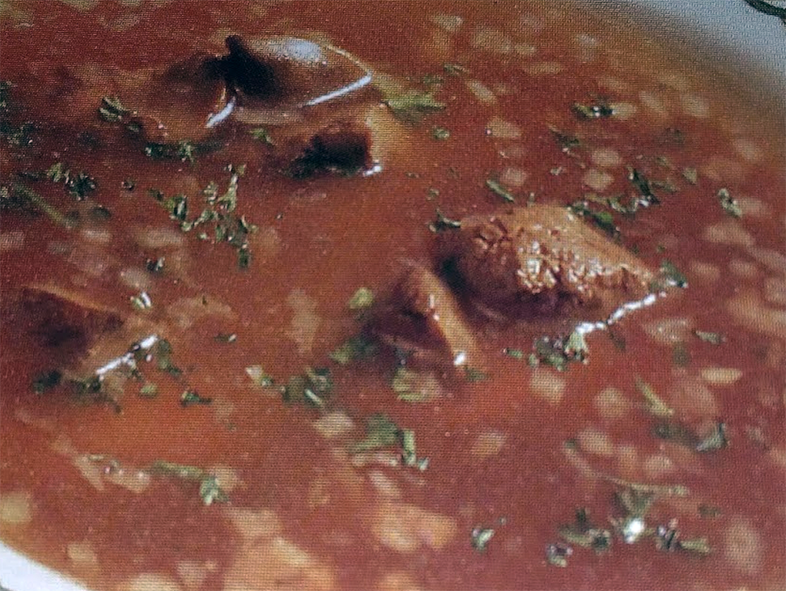 spanish chicken liver soup in a soup bowl