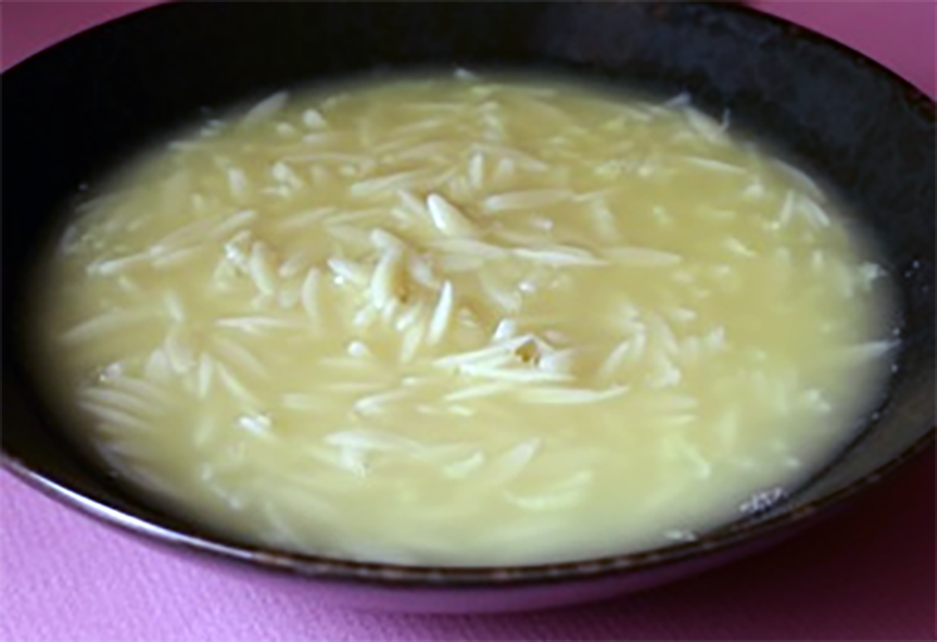 soup of chicken meat in a white base with breadcrumbs, almonds and cream