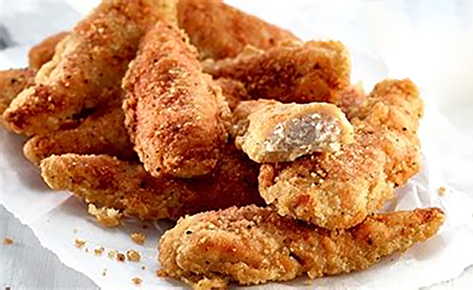 southern fried chicken goujons served on kitchen paper