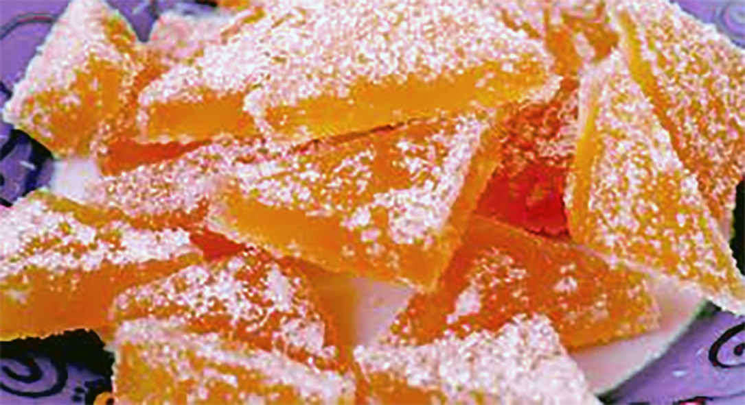 sugared spanish candy wedges on a plate
