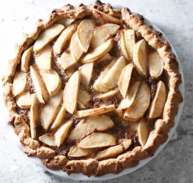single curst pie of layered apple wedges