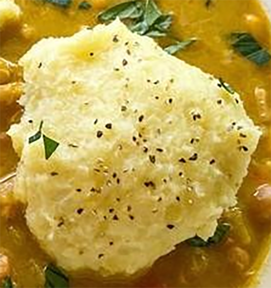 white sweet potato fufu on a bean stew