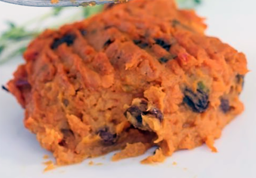 baked jamaican sweet potato stuffing on a plate