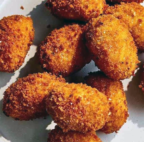 sweetbread croquettes piled on a plate