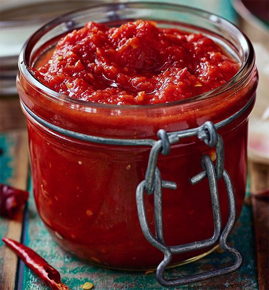 tomato sauce with chilli vinegar in a jar