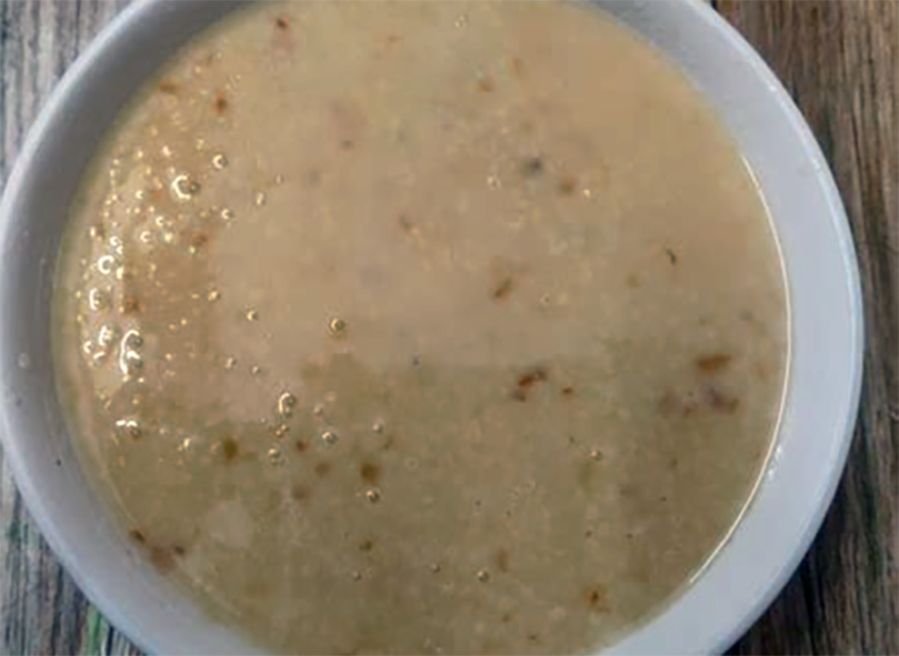 millet porridge served in a white bowl