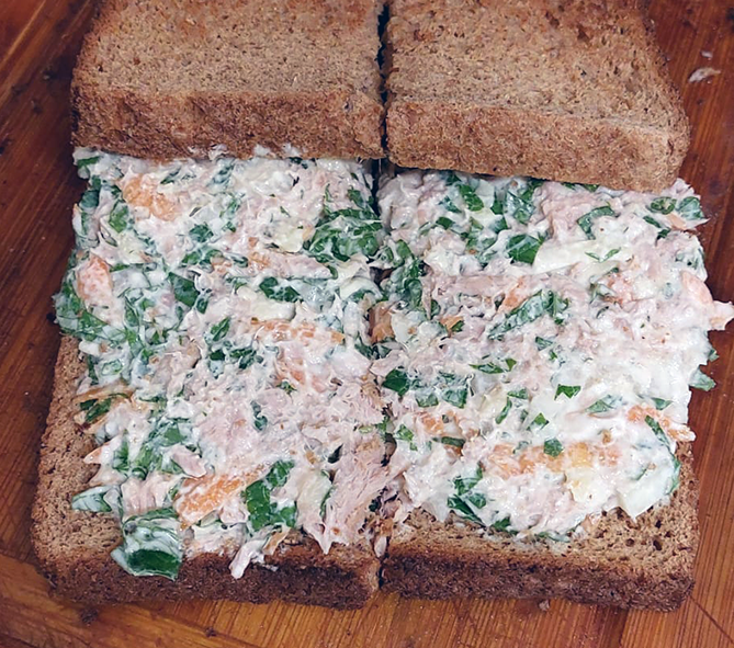 tuna, cheese and garlic mustard sandwich filling with yoghurt on toast