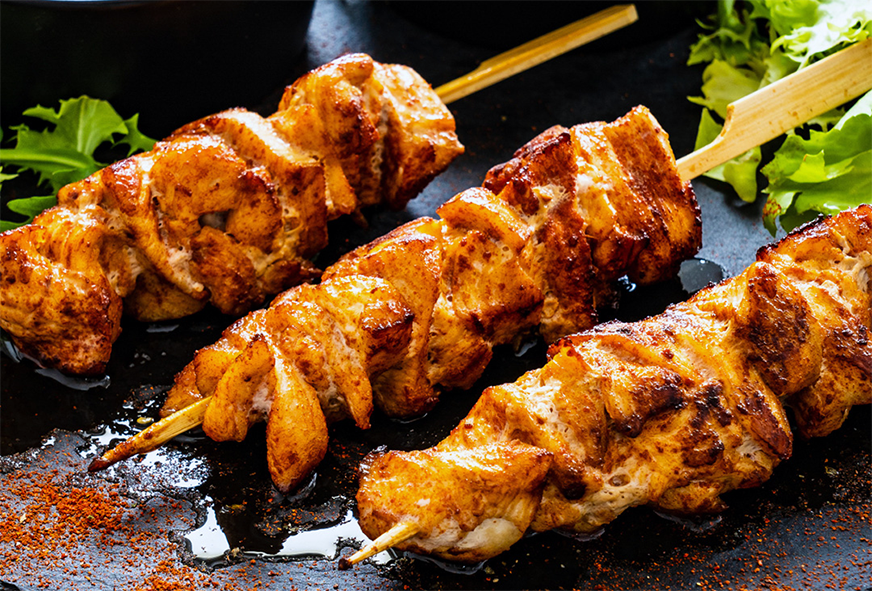 chicken shashliks served on a slate