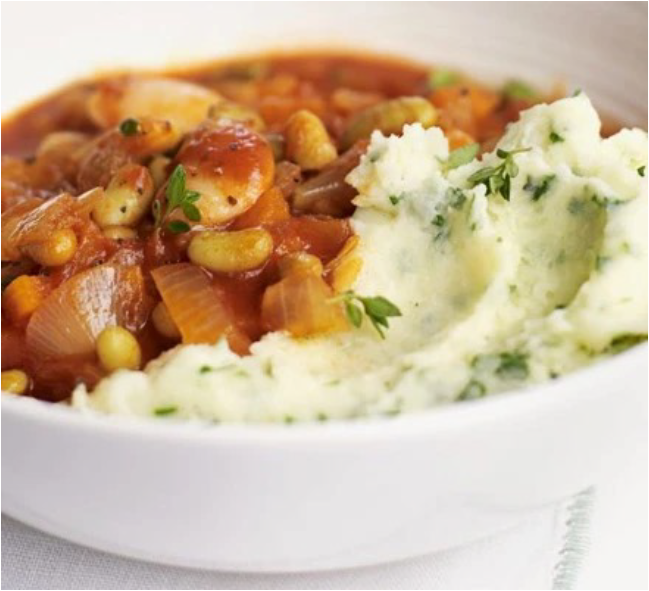 vegetarian somerset stew of beans served in a bowl with parsley mash