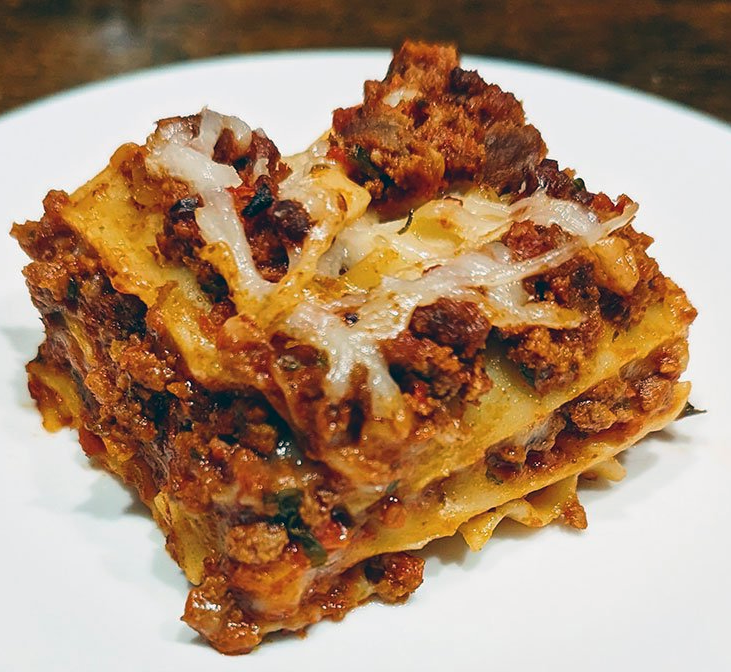 square of venison lasagne on a white plate