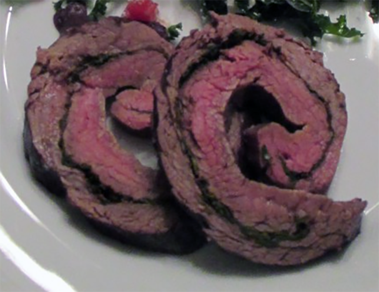 two slices of collared beef on a plate