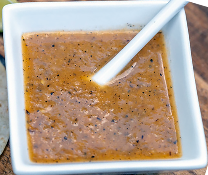 Yucatan style mashed charred habanero salsa in a white dish