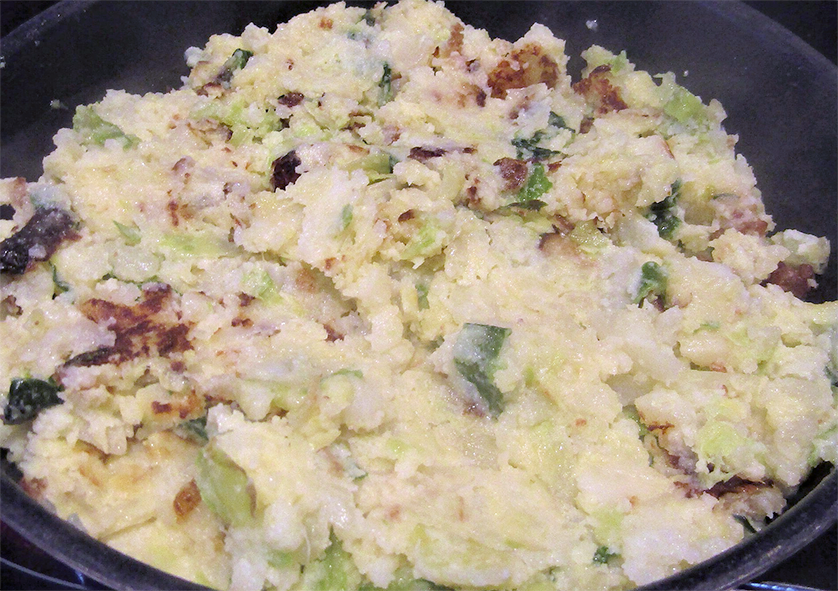bubble and squeak cooking in a frying pan