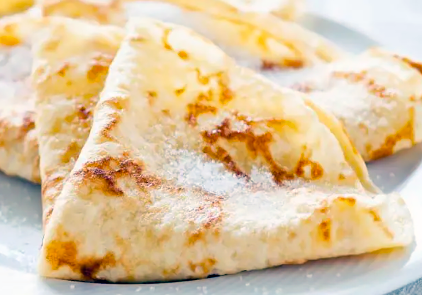 cassava flour pancake served folded on a plate