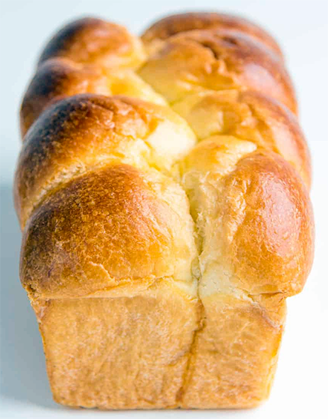 Brioche loaf against a white background