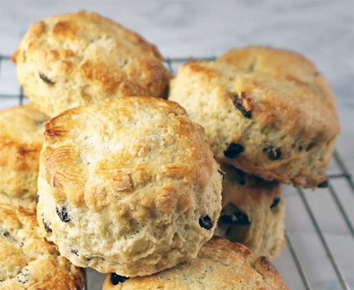 basic sultana scones piled on a wire rack