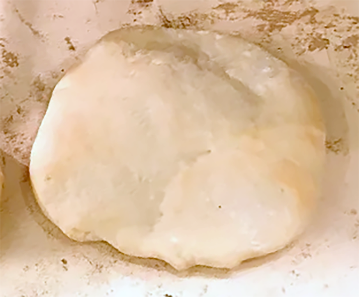 puffed israeli-style pita bread fresh from the oven