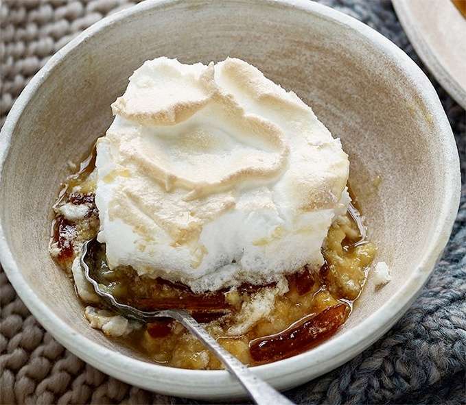 marmalade queen of puddings in a bowl with a spoon