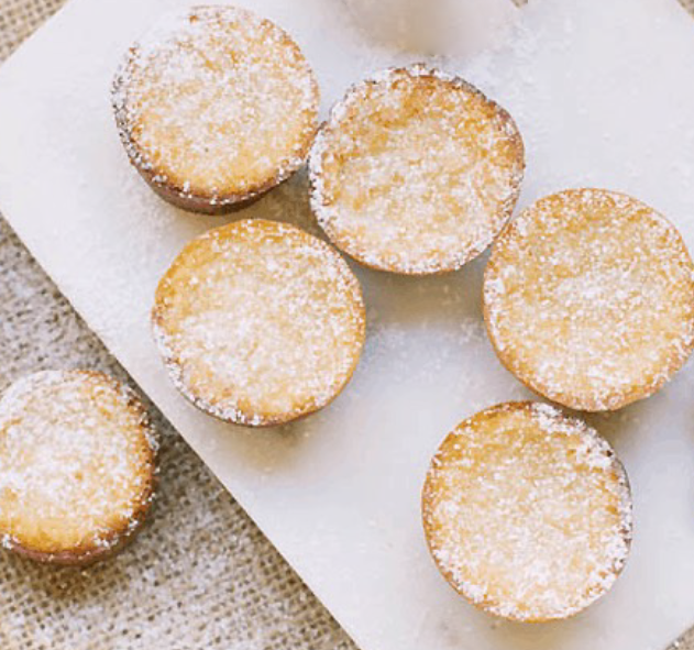 baked mini mochi rice cakes on a chopping board
