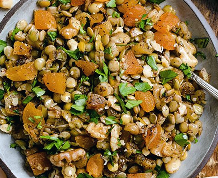 Mushosh, lentil and apricot salad garnished with coriander leaves