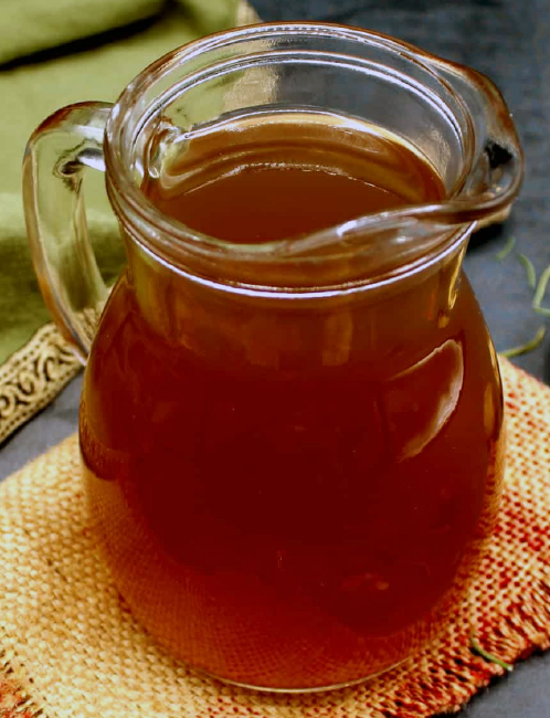 mushroom stock in a jug