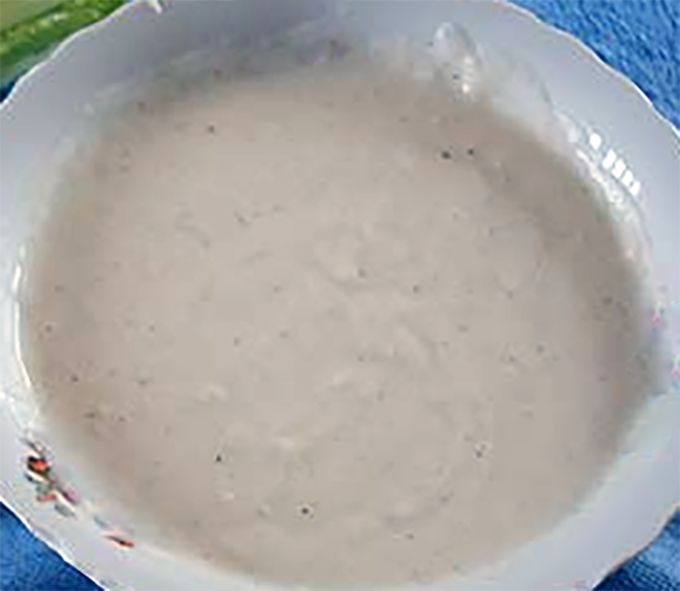 salsa bayda, lebanese white sauce of milk thickened with roux in a bowl
