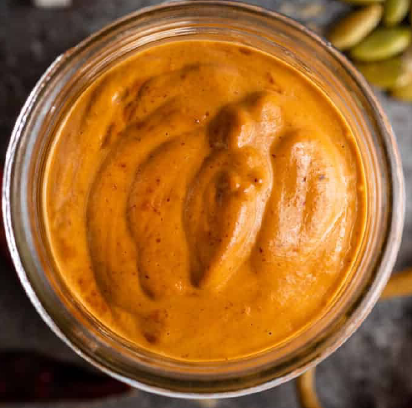salsa macha mole in a glass jar viewed from above