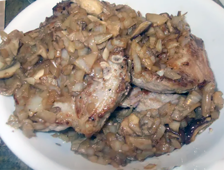 somerset pork with apples cream stew served on a plate