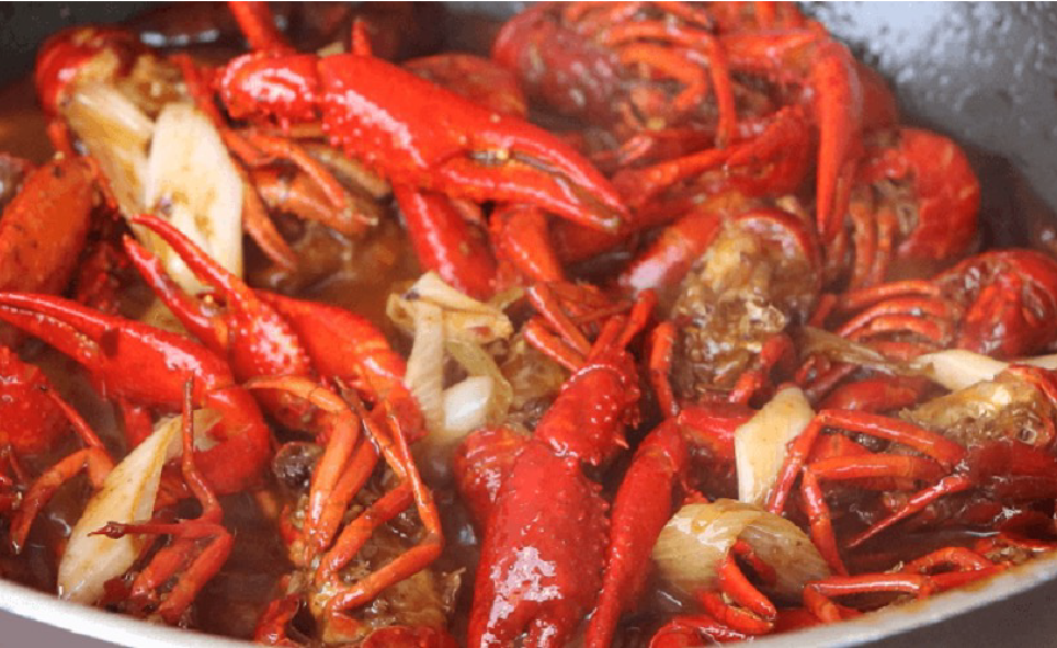 Chinese spicy crayfish stir-frying in a wok