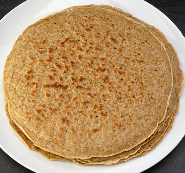 Staffordshire oatcakes (pancakes) piled on a plate