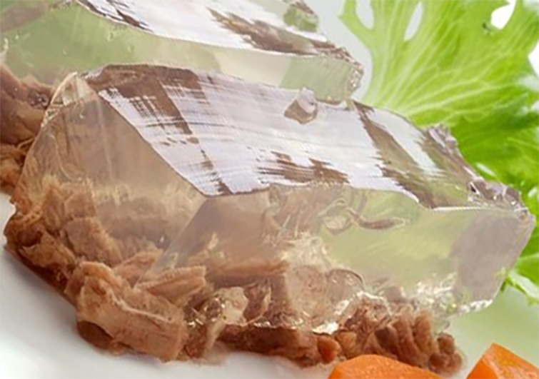 transparent aspic on a bed of shredded meat