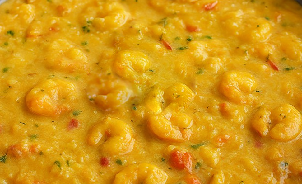 prawn-topped savoury squash and cheese custard served in a bowl