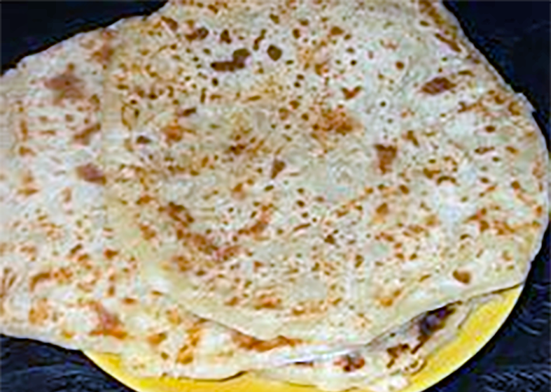 Somali apricot flatbreads stacked on a plate