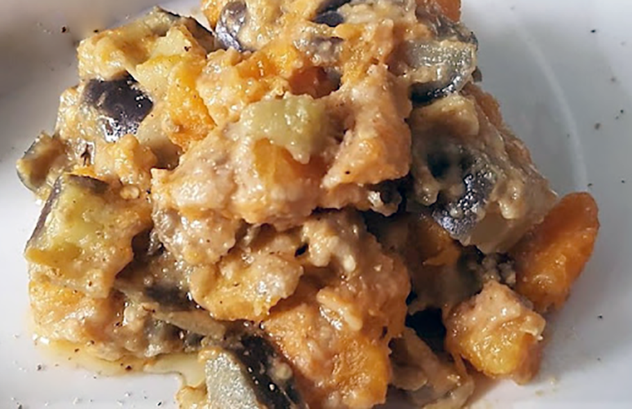 lightly spiced vegetables in a peanut butter base piled on a plate