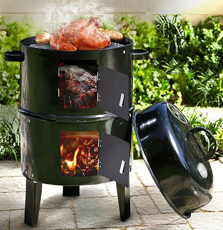 Cooking in a barbecue smoker outdoors.