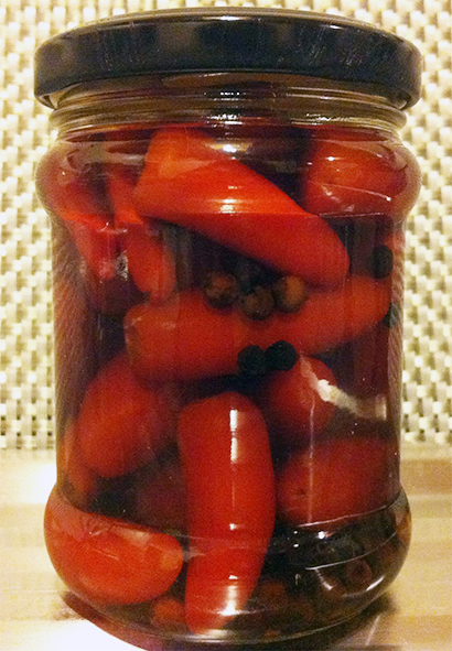 pickled jalapeno chillies in a glass jar