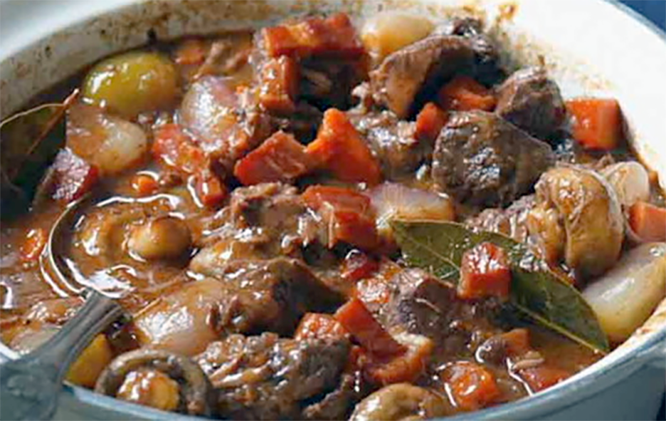 Beef daube cooking in a cast iron casserole