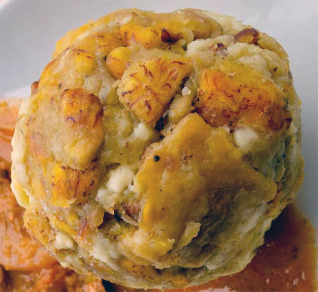 Ecuadorian green plantain ball with pork or cheese and sweetcorn kernels