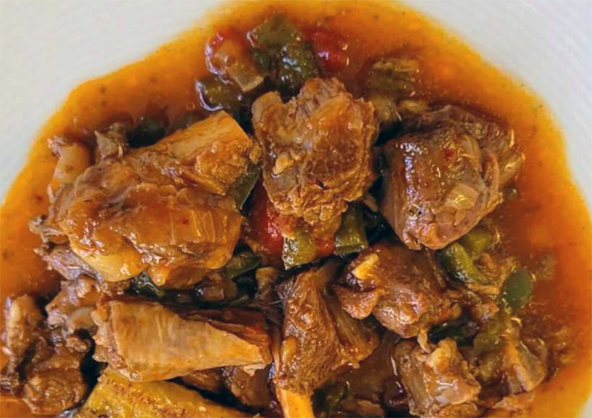 Bonaire kabritu stoba, goat stew served on a plate