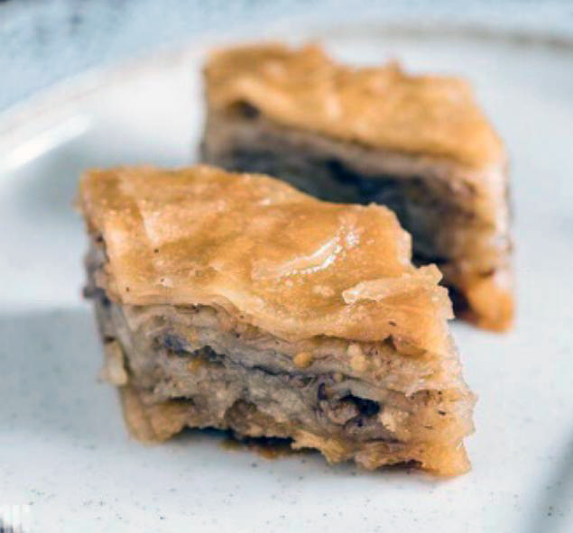 two diamonds of Bosnian baklava on a plate