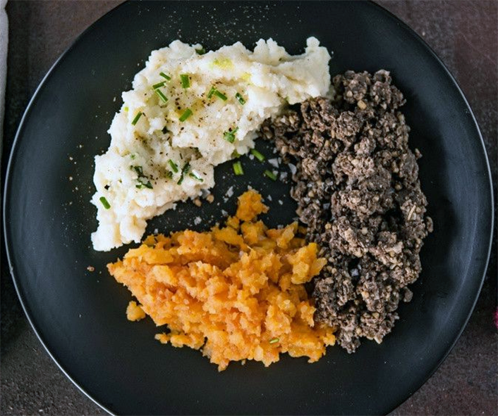 Traditional Burns supper dish of haggis, neeps and tatties.
