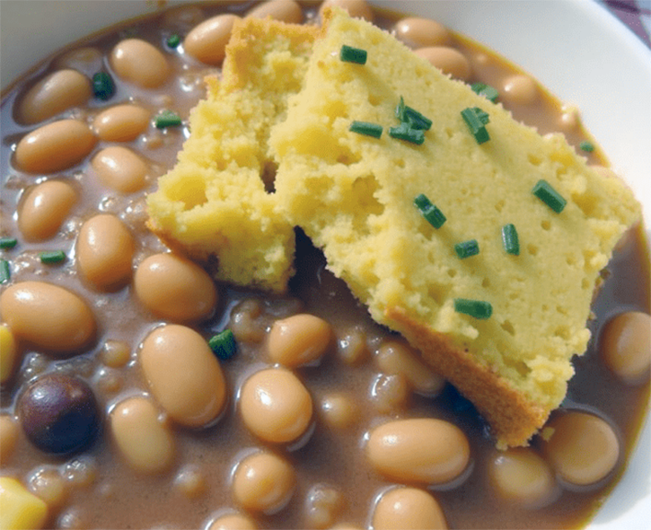 alt cajun-style beans served in a bowl with buttermilk cornbread