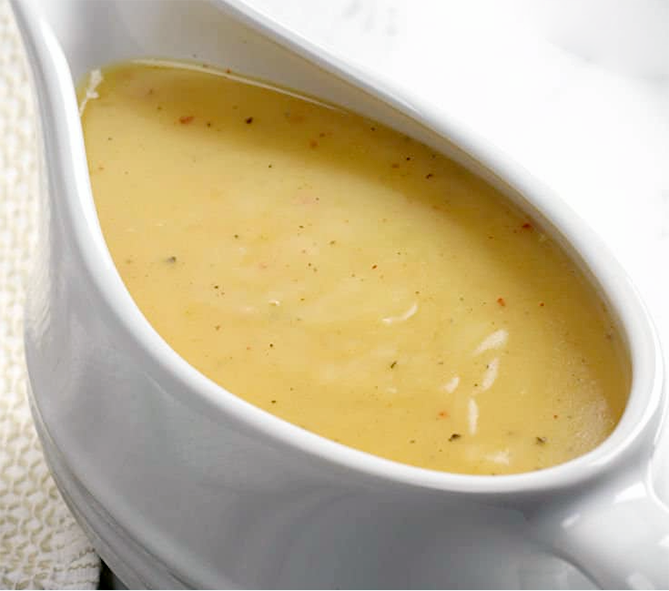 Cajun gravy in a sauce boat