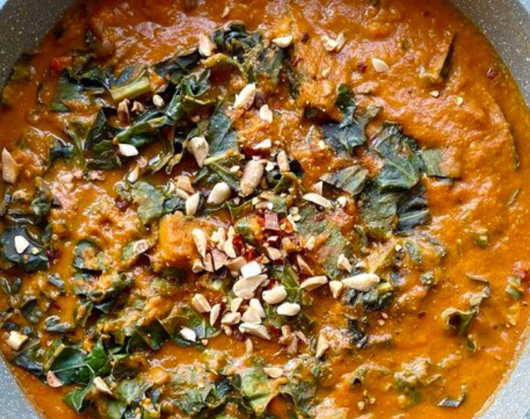 curry of carlin peas, perpetual spinach and peanut butter in a cast iron casserole