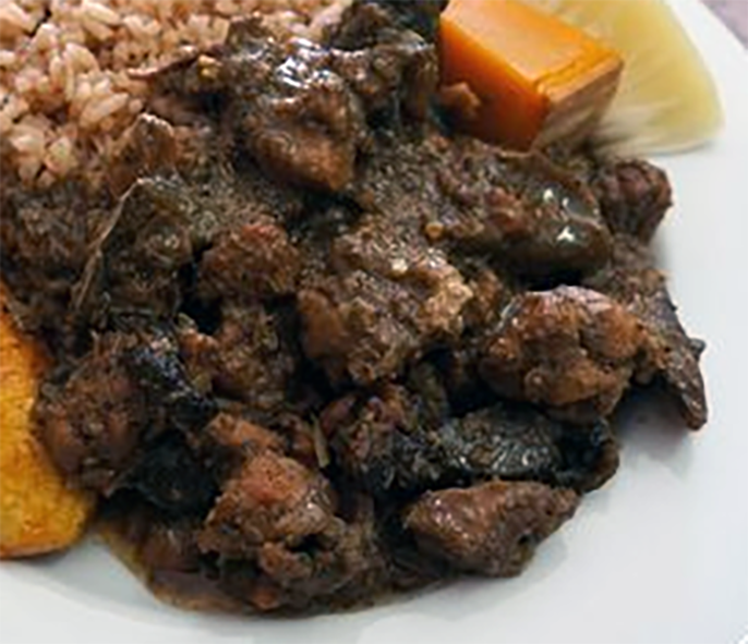 Cayman islands turtle stew served on a plate