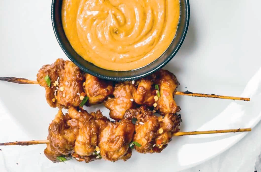 Chicken satay skewers with peanut dipping sauce