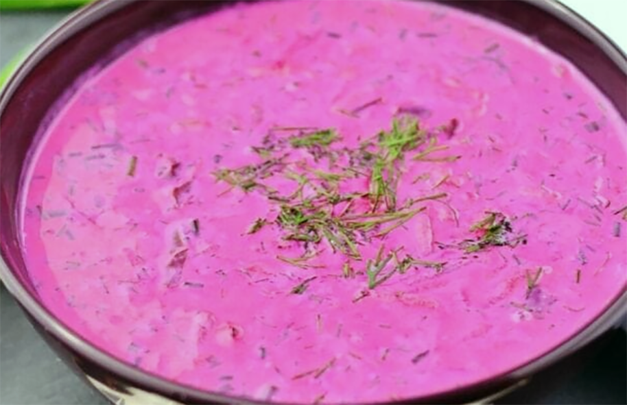 cold beetroot and beetroot leaf soup in a kefir and yoghurt base served in a bowl